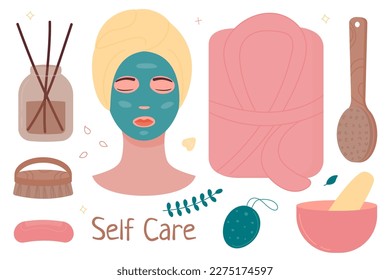 A set of women in the bathroom – a bathrobe, massage brushes, a mortar with a pestle, soap, a washcloth, a jar with incense sticks. The head of a girl in a bath towel with a cosmetic mask on her face.