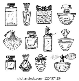 Set of Women's perfume in a bottle. Beautiful fashionable glass accessory. Hand Drawn Sketch. Vintage style.