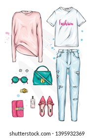 Set of women's stylish odezhy. Beautiful pants, sweater, T-shirt, shoes and bag. Fashionable clothes and accessories. Vector illustration for greeting card or poster.