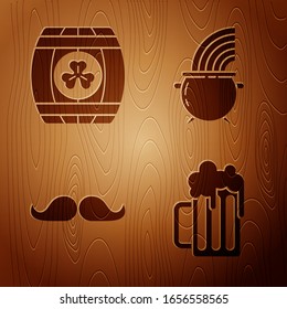 Set Wooden beer mug, Wooden barrel with four leaf clover, Mustache and Witch cauldron and rainbow on wooden background. Vector