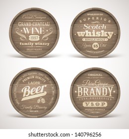 Set of wooden casks with alcohol drinks emblems - vector illustration