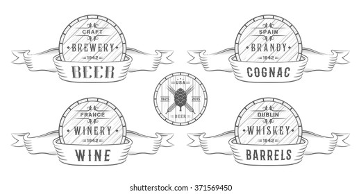 Set of wooden casks with alcohol drinks emblems and labels. Set of vintage logo, badge, template with wooden barrels for beer house, bar, pub, wine and whiskey market, brewery, restaurant and winery.