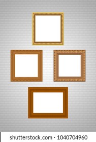 Set of wooden decorative vintage square and rectangular picture frames with empty space for picture or photo on white brick wall.