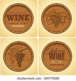 Set of wooden kegs with wine emblems