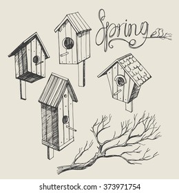 Set from the wooden nesting boxes drawn by hand.Birdhouse made of boards.Vector illustration.IIsolated.