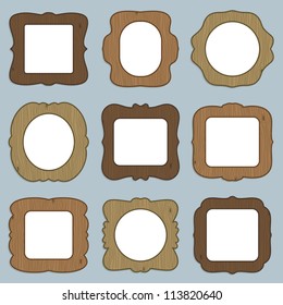 set of wooden picture frames with copy space