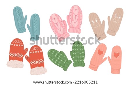 Set of wool knitted mittens. Cozy winter gloves. Vector flat illustration. Cute mittens. Winter clothes