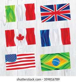 Set of world flags on white wood texture