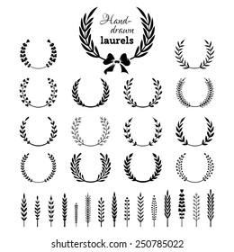 Set of wreaths and branches. Hand-drawn black design elements isolated on white background. 
