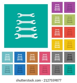Set of wrenches multi colored flat icons on plain square backgrounds. Included white and darker icon variations for hover or active effects.