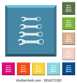 Set of wrenches white icons on edged square buttons in various trendy colors