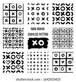 Set of XOXO seamless patterns. Vector Abstract backgrounds with ink brush strokes. Monochrome Scandinavian hand drawn print. Grunge texture with simbols of zero, cross and heart.