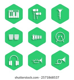 Set Xylophone, Trumpet, Drum and drum sticks, Headphones,  and Music synthesizer icon. Vector