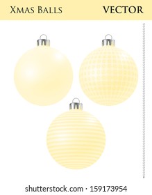 A set of yellow Christmas balls with different ornaments