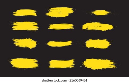 Set of yellow grunge brushes of various shapes for design needs