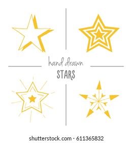 Set of yellow hand drawn doodle stars. Vector sketch cartoon star icons.