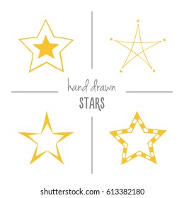 Set of yellow hand drawn doodle stars. Vector sketch cartoon star icons.