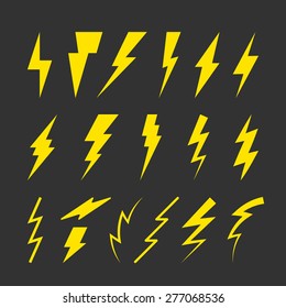 Set of Yellow Thunderbolt Symbols. Vector Danger Signs. Electrical Power Silhouettes Icons. Zig Zag Logo Elements.