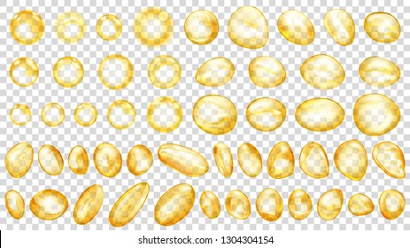 Set of yellow translucent water drops and bubbles of different shapes, isolated on transparent background. Transparency only in vector format