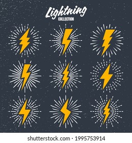 Set of yellow vintage lightning bolts and sunrays on grunge background. Lightnings with sunburst effect. Thunderbolt, electric shock sign. Vector illustration.