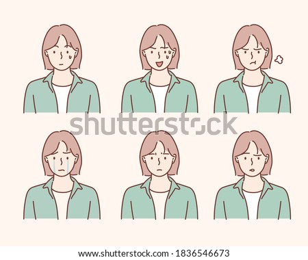 Set of young woman's portraits with different emotions. Hand drawn style vector design illustrations.