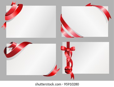 Sets of white paper with stylish red ribbon