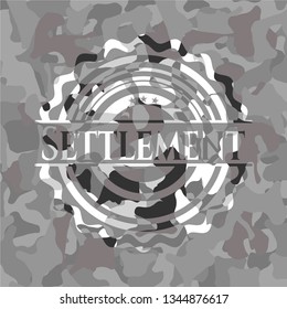 Settlement on grey camouflage texture