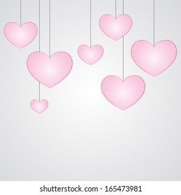 Seven hanging small pink hearts with simple lace-like outline on laconic pure light grey background