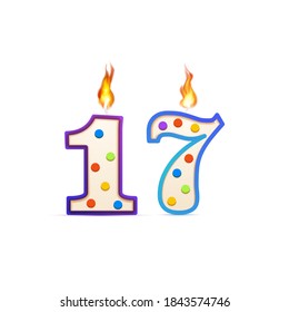 Seventeen years anniversary, 17 number shaped birthday candle with fire isolated on white