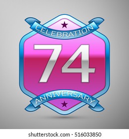 Seventy four years anniversary celebration silver logo with blue ribbon and purple hexagonal ornament on grey background.