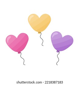 Several balloons in the form of hearts on white background