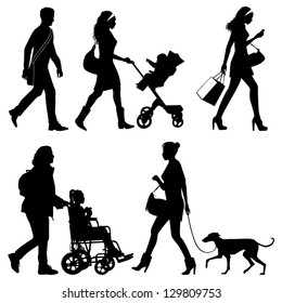 several people on the street - vector silhouettes