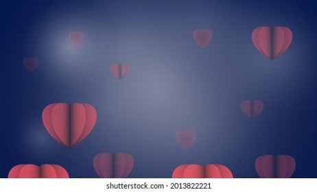 Several red paper hearts on a blue background.