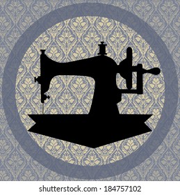 Sewing machine. Contour of the sewing machine, isolated on patterned wallpaper.