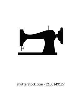 Sewing machine icon in black flat glyph, filled style isolated on white background