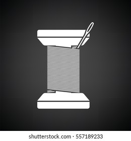 Sewing reel with thread icon. Black background with white. Vector illustration.