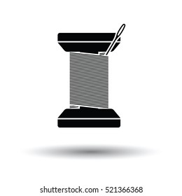 Sewing reel with thread icon. White background with shadow design. Vector illustration.