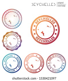 Seychelles badge. Colorful polygonal island symbol. Multicolored geometric Seychelles logos set. Vector illustration.