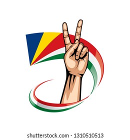 Seychelles flag and hand on white background. Vector illustration
