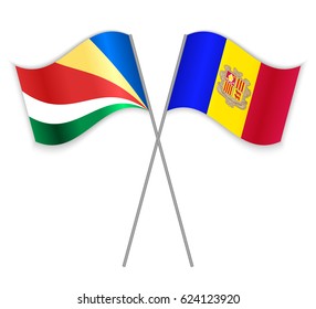 Seychellois and Andorran crossed flags. Seychelles combined with Andorra isolated on white. Language learning, international business or travel concept.