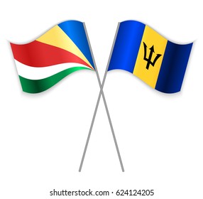 Seychellois and Barbadian crossed flags. Seychelles combined with Barbados isolated on white. Language learning, international business or travel concept.