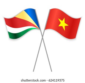 Seychellois and Vietnamese crossed flags. Seychelles combined with Vietnam isolated on white. Language learning, international business or travel concept.