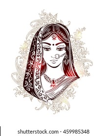 Shaadi. Indian woman in a wedding dress and bridal jewelry in the background of patterns of paisley.