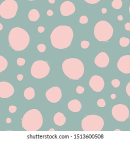 Shabby chic irregular polka dots vector seamless pattern. Trendy seamless pattern with pink dots on light green background. Vector illustration. Surface pattern design for fabric, wallpaper