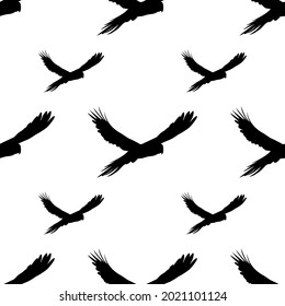 The shadow of a flying bird. Seamless pattern. Black and white fabric pattern. Black bird on a white background.