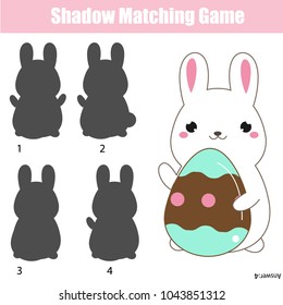 Shadow matching game for children. Shadow matching game. Easter theme activity for kids and toddlers. Find the right shadow for cute Rabbit holding Easter egg