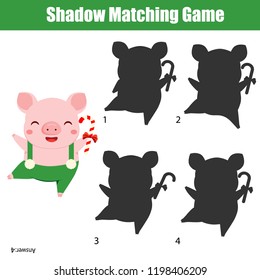 Shadow matching game for children. Find the right shadow for funny pig holding Christmas candy cane. New year theme activity for kids