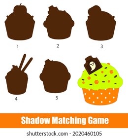 Shadow matching game. Find silhouette for Halloween cupcake. Educational kids activity