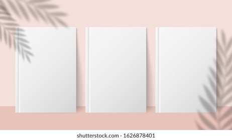 Shadow plant. Overlay palm leaf effect on white book cover. Vector realistic books mockups and blurred nature background