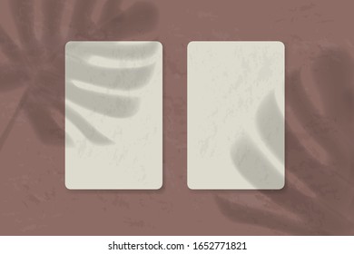 shadow of a tropical leaf on paper. printable template. flyer, flyer, business card, mockup. trend vector graphics